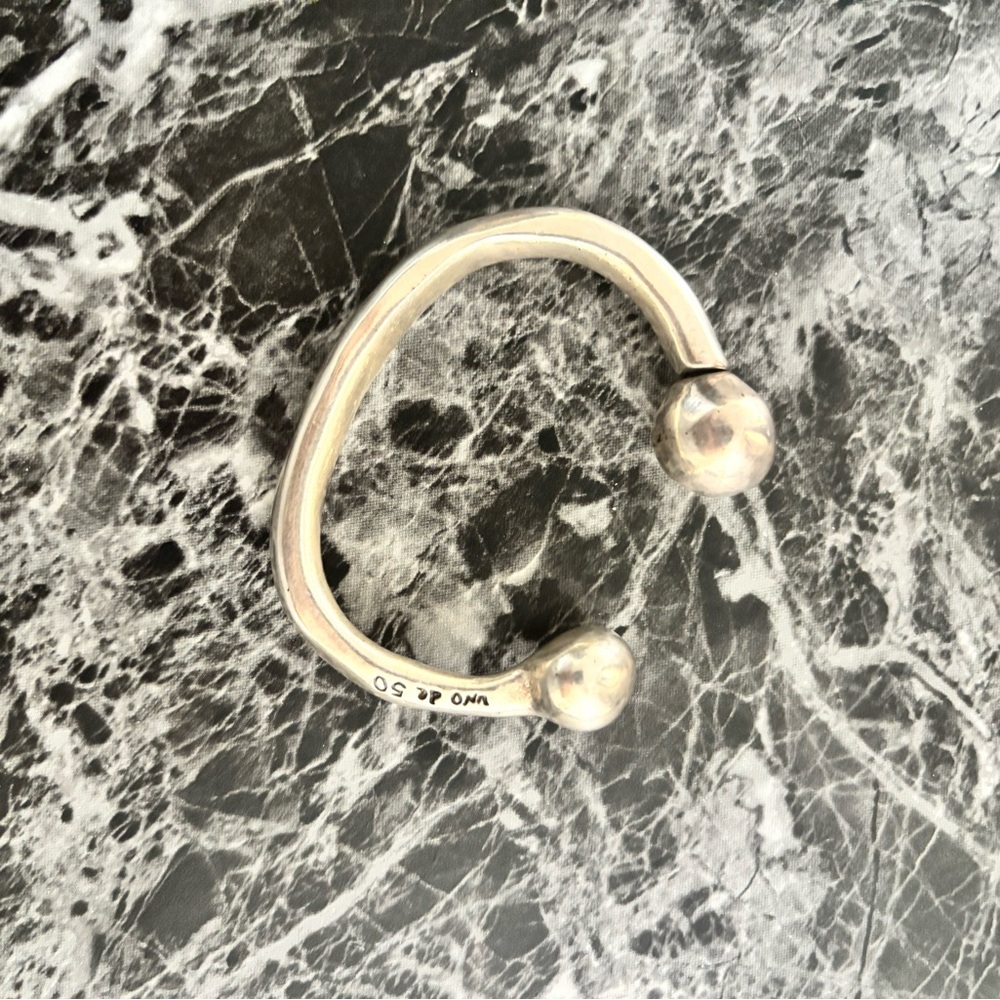 Uno de 50 Bangle